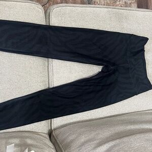 Black and grey Savvi Zebra stripe leggings